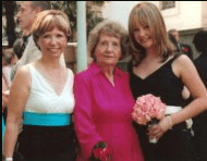 photo of three smiling women 